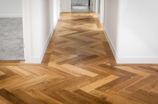 De Marque Oak Herringbone Cognac engineered timber installed room example